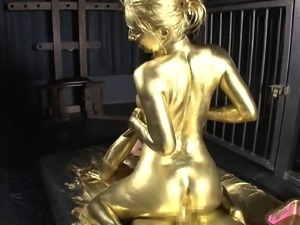 Painting her with the gold color and poking her expensive pussy