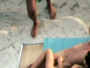 Mutual spooning pleasures of amateur slender couple right on the beach