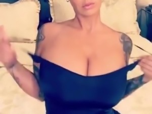 Amber Rose teasing her big tits