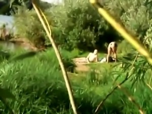 Naughty young lovers having passionate sex in the outdoors
