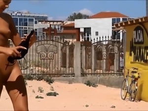Nudist beach voyeur finds two sexy girls enjoying the sun