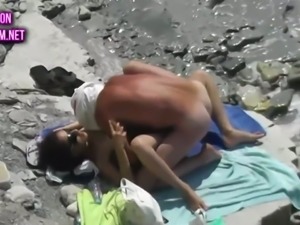 These shameless beach fuckers are enjoying some passionate fuck on the beach