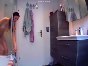 Lovely brunette teen exposes her sexy body in the bathroom
