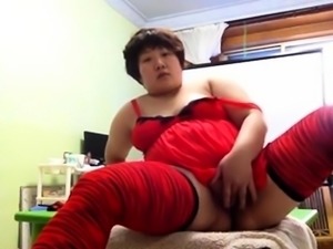 Chubby Asian teen in red