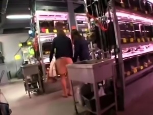Pantyhosed Asian lady has a guy fingering her cunt in public 