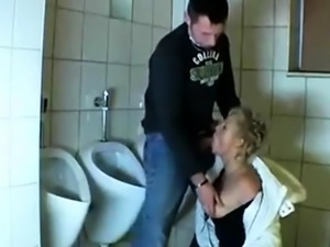 young Guy fucks a mature in a public bathroom