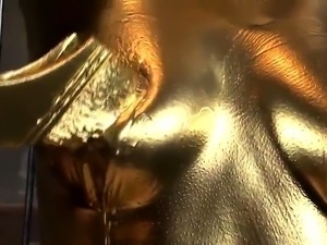 Submissive Asian slut painted in gold makes herself cum hard