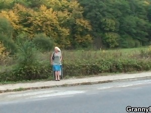 Hitchhiking old granny and boy