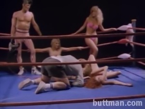 Sexy female wrestlers end up topless in the middle of the ring