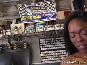 Beautiful ebony Bellah Dahl enjoys group sex with mechanics in garage...