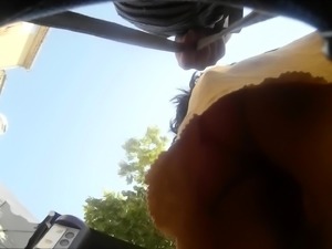 Sexy French babe with a lovely ass voyeur upskirt outside