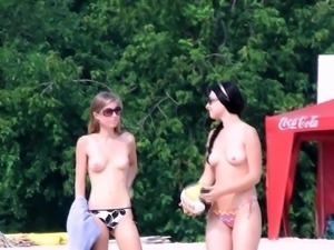 Dashing young nudist chicks have fun at the beach