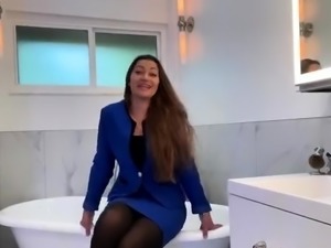 Enticing mom vibrating her pussy to orgasm in the bathroom